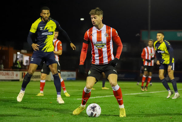Harriers hold firm after Lewis leveller to deny Alty a sixth straight win